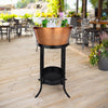 Large ice bucket with stand for chilling drinks at a party.  