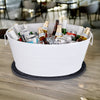 Large white wine chiller bucket with rubber spill mat.  Protect bar top and tabletop surfaces from spills, splashes, and water damage.