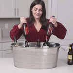 Beverage tub made of stainless steel for chilling drinks at parties.  Holds up to 12 bottles of wine or 30 12oz bottles of beer with ice to keep it chilled for hours.  Use with complementary serving tray, bar mat, or beverage tub stand for all your party needs.